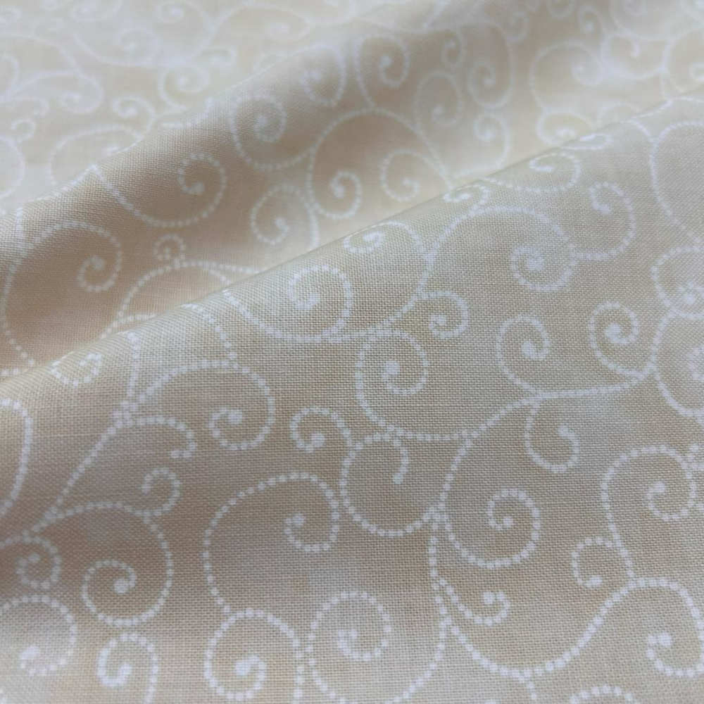 beige marbled American patchwork fabric with spirals